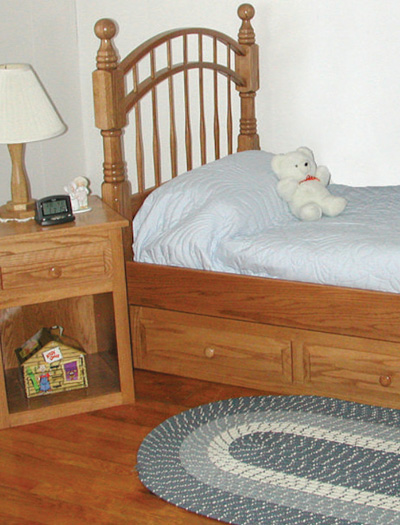Children's solid wood bed with storage drawers and nightstand