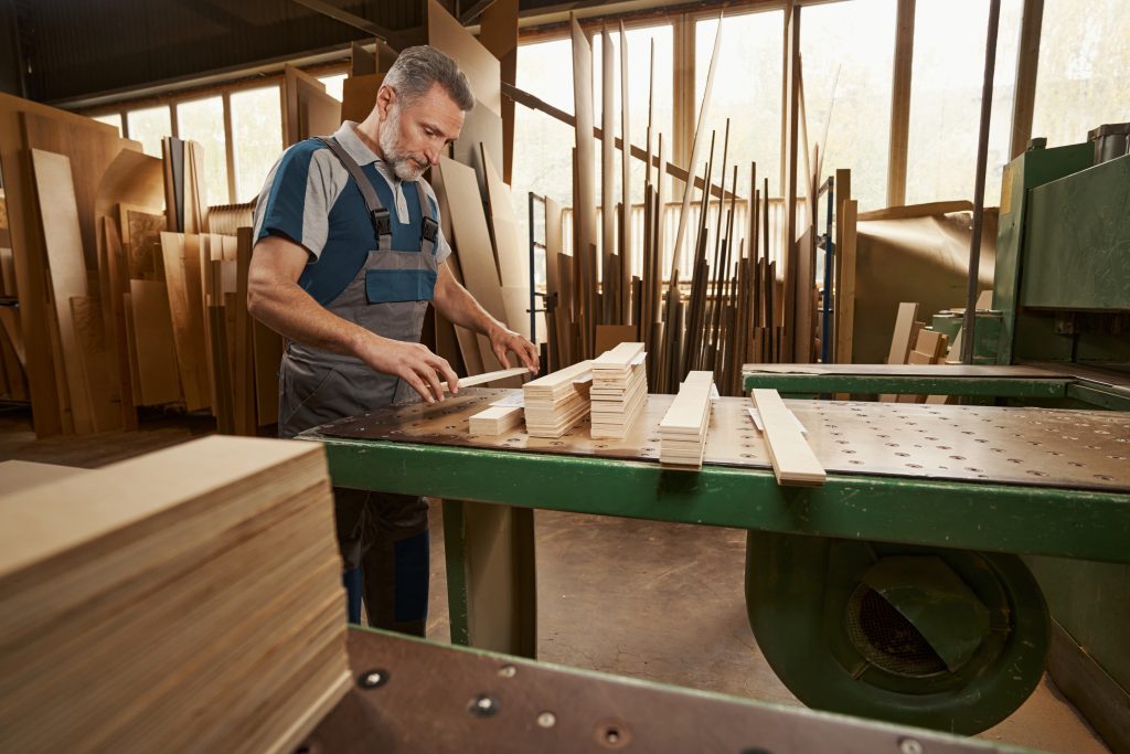Carpenter working on furniture
