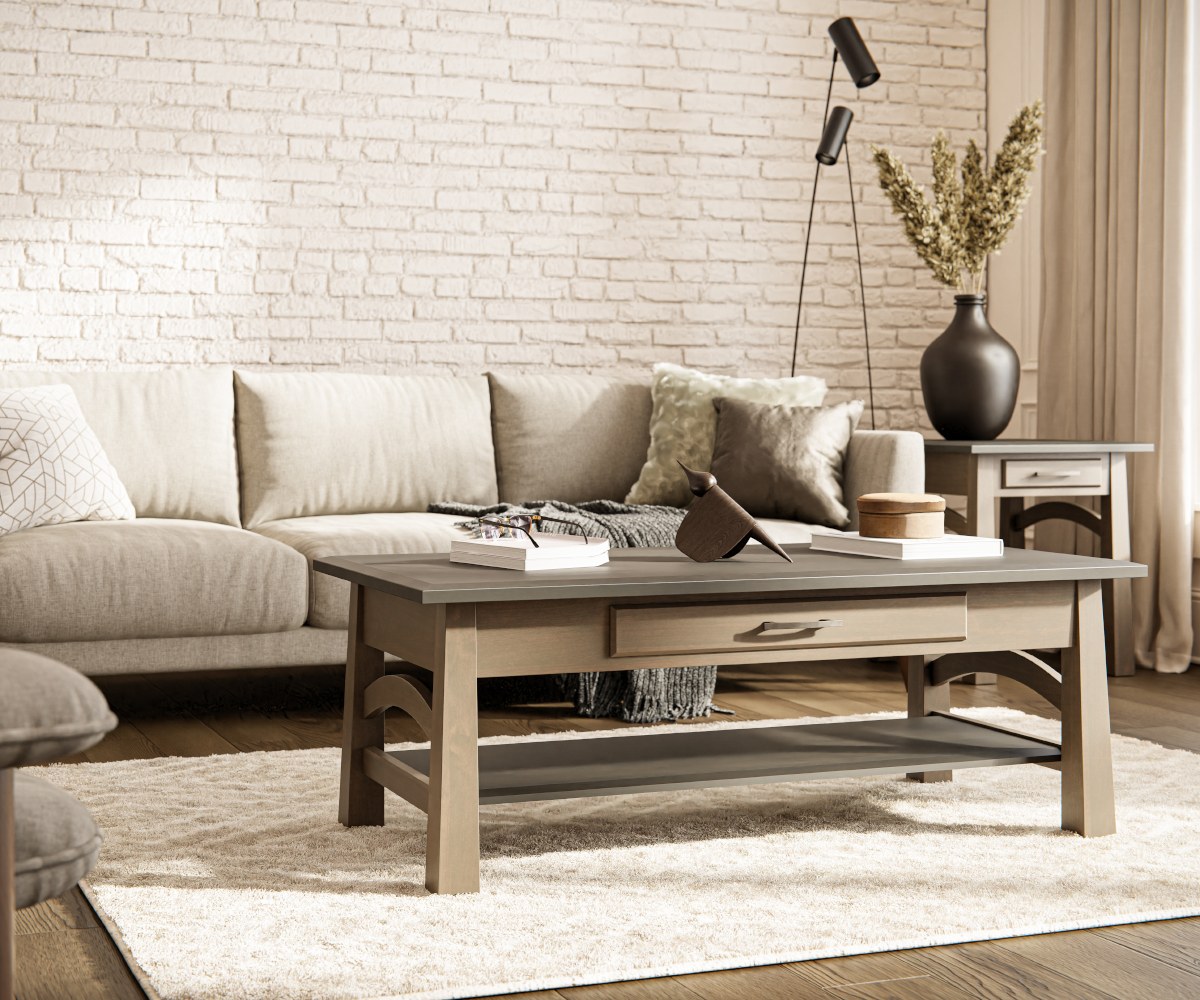 Solid wood coffee table with a lower shelf in front of a linen sofa